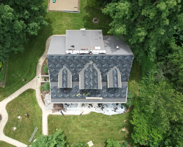 top down view of house getting roof replacement