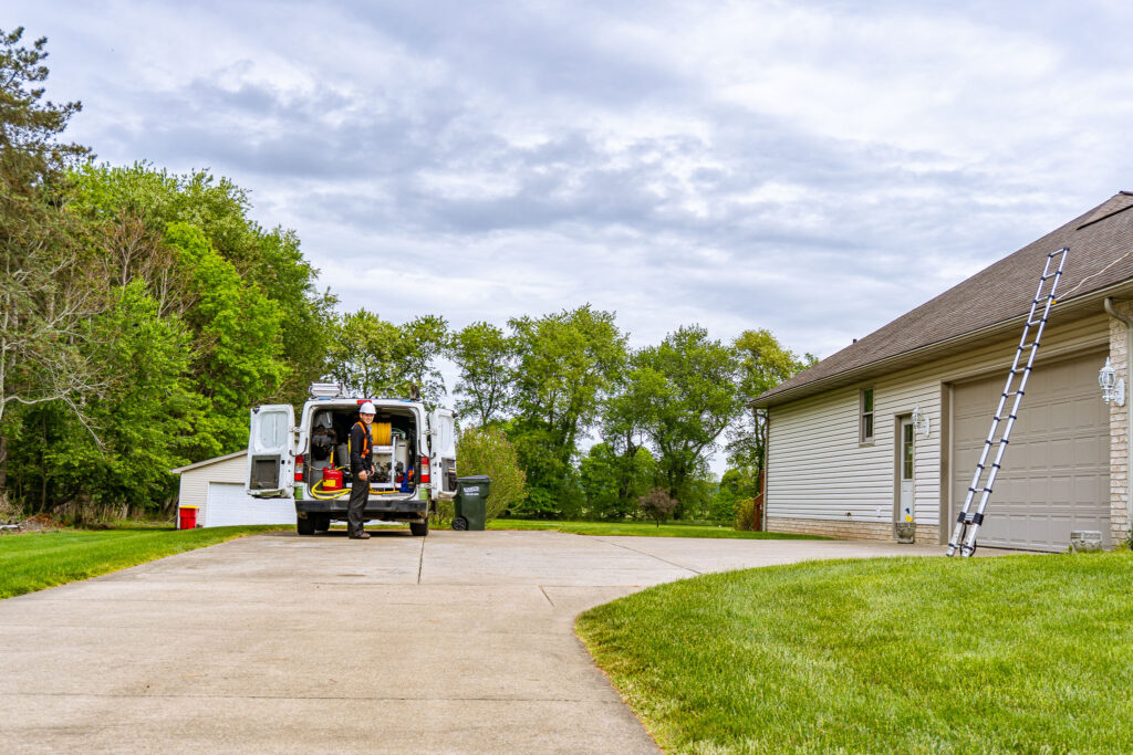ladder by roof to make a repair in Wooster Ohio